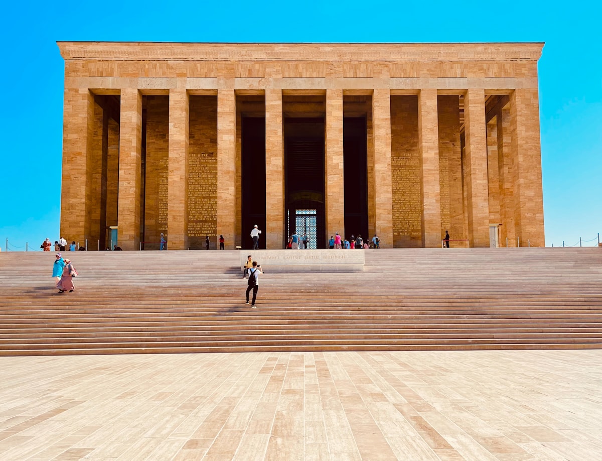 a group of people that are standing in front of a building