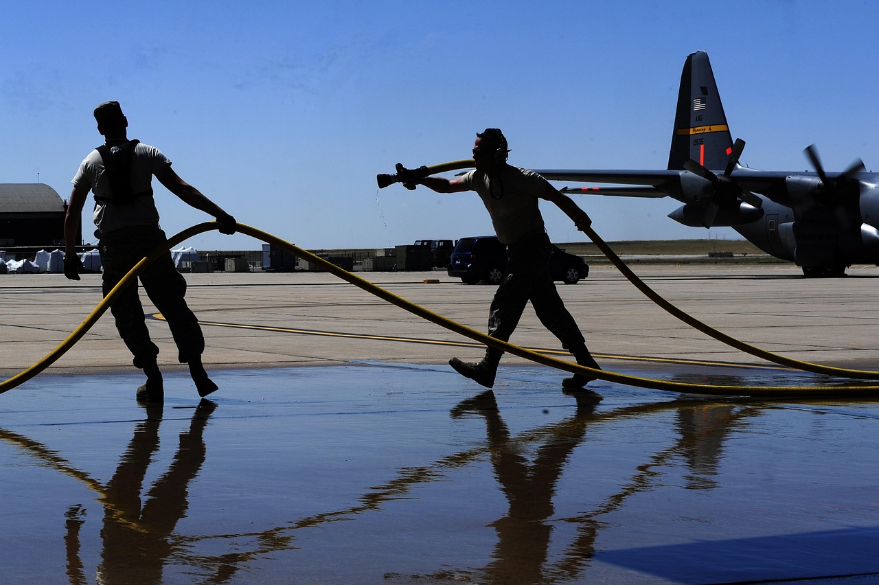 us air force, men, airmen, military, runway, base, fire hose, carrying, silhouettes, outside, blue fire, airmen, airmen, airmen, airmen, airmen, fire hose, fire hose, fire hose