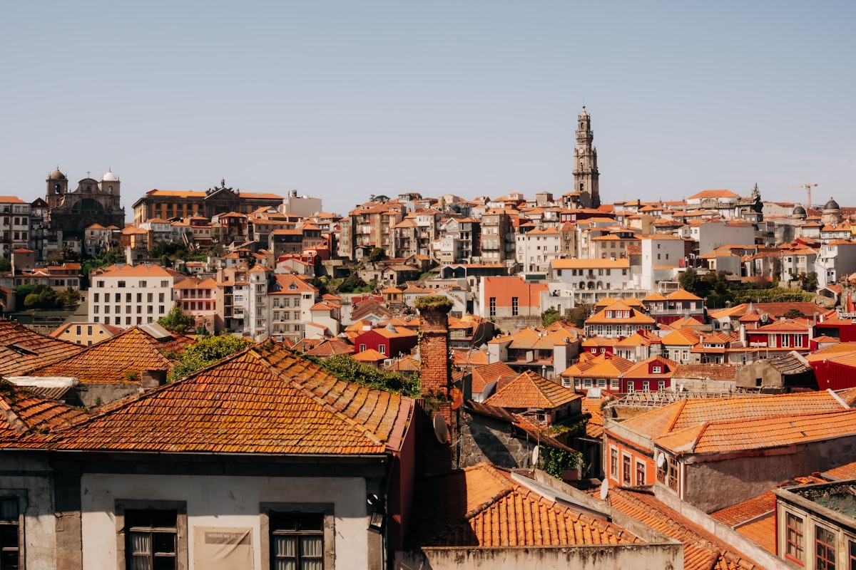 Rooftops of a historic european city under a clear sky