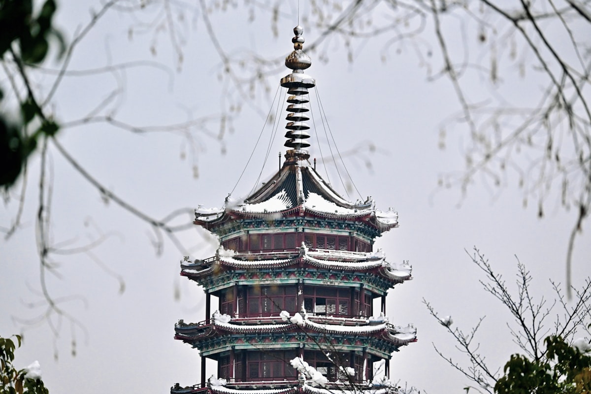 a tall tower with a clock on top of it