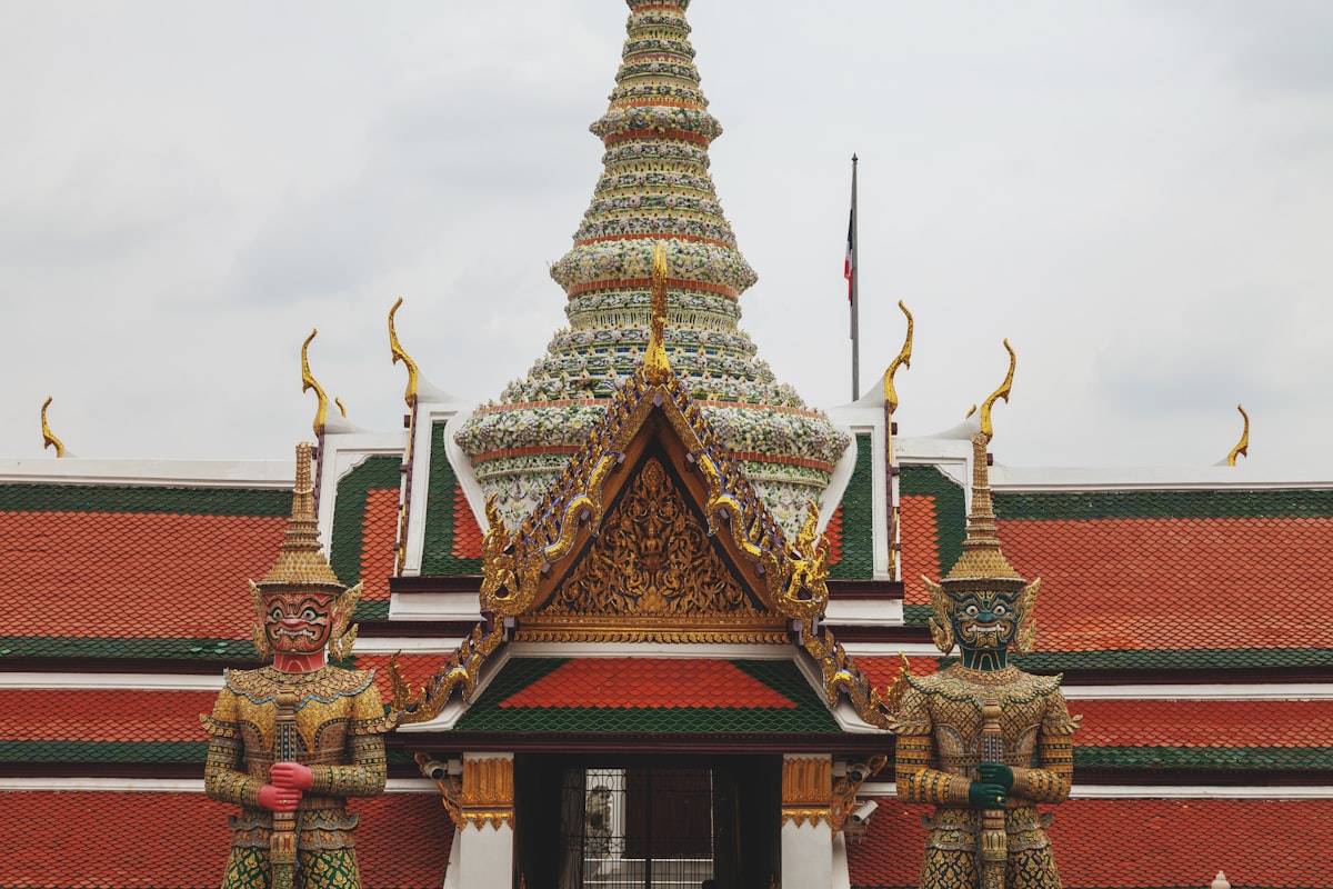 Two guardian statues at temple entrance