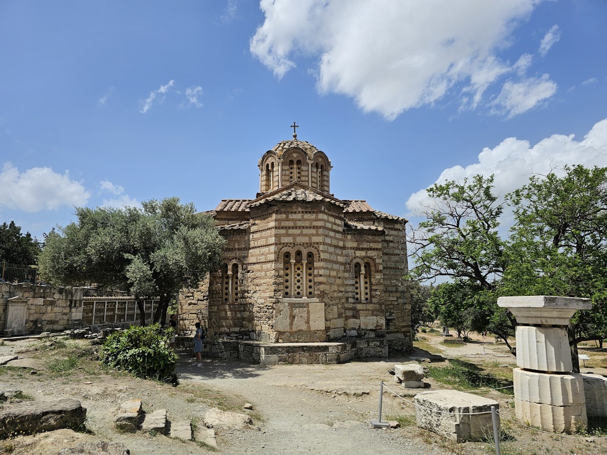 An old building with a cross on top of it