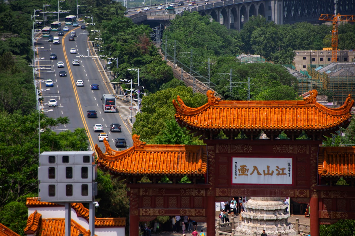 a view of a city with a bridge in the background