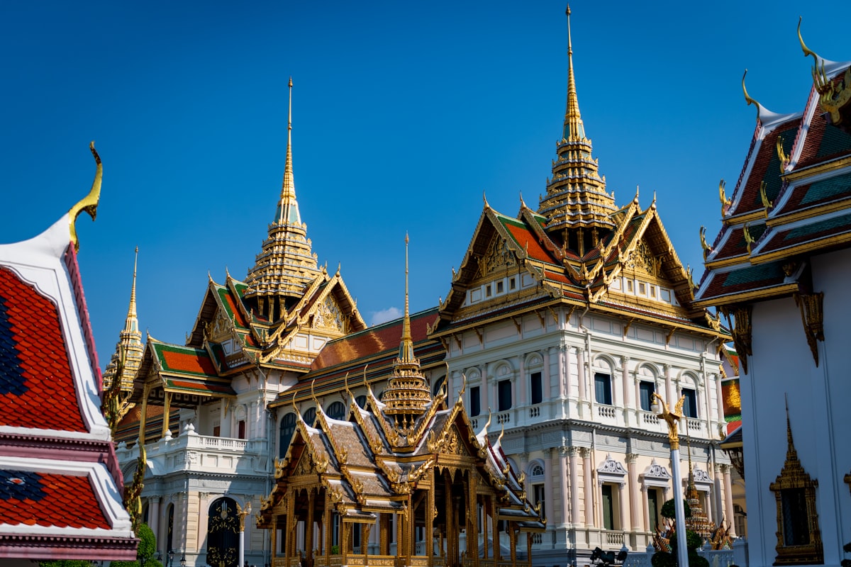 a large white building with many spires