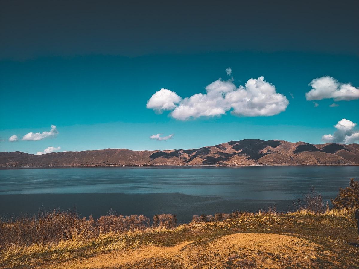 a large body of water surrounded by mountains