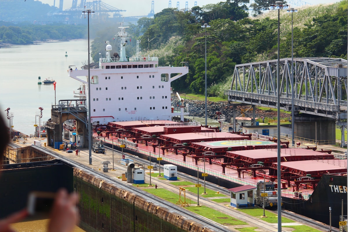 a large boat is docked at a dock