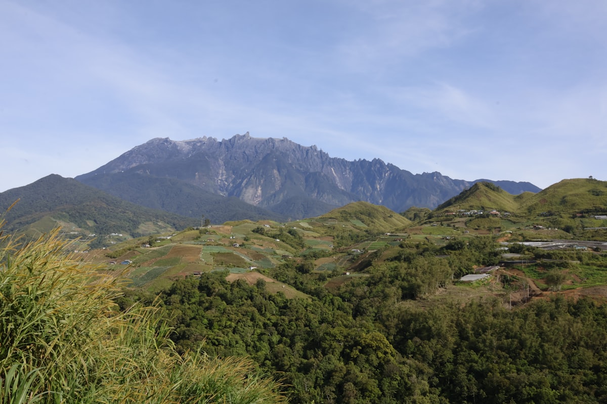 Majestic mountain range under a clear blue sky.