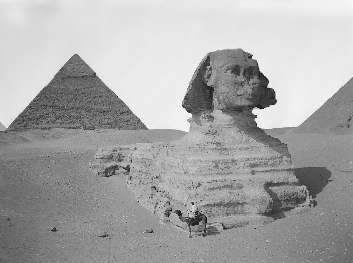 The great sphinx and pyramids in the desert