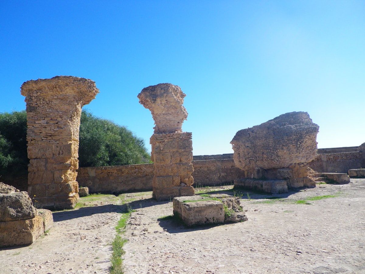 Ancient stone ruins against a clear blue sky.