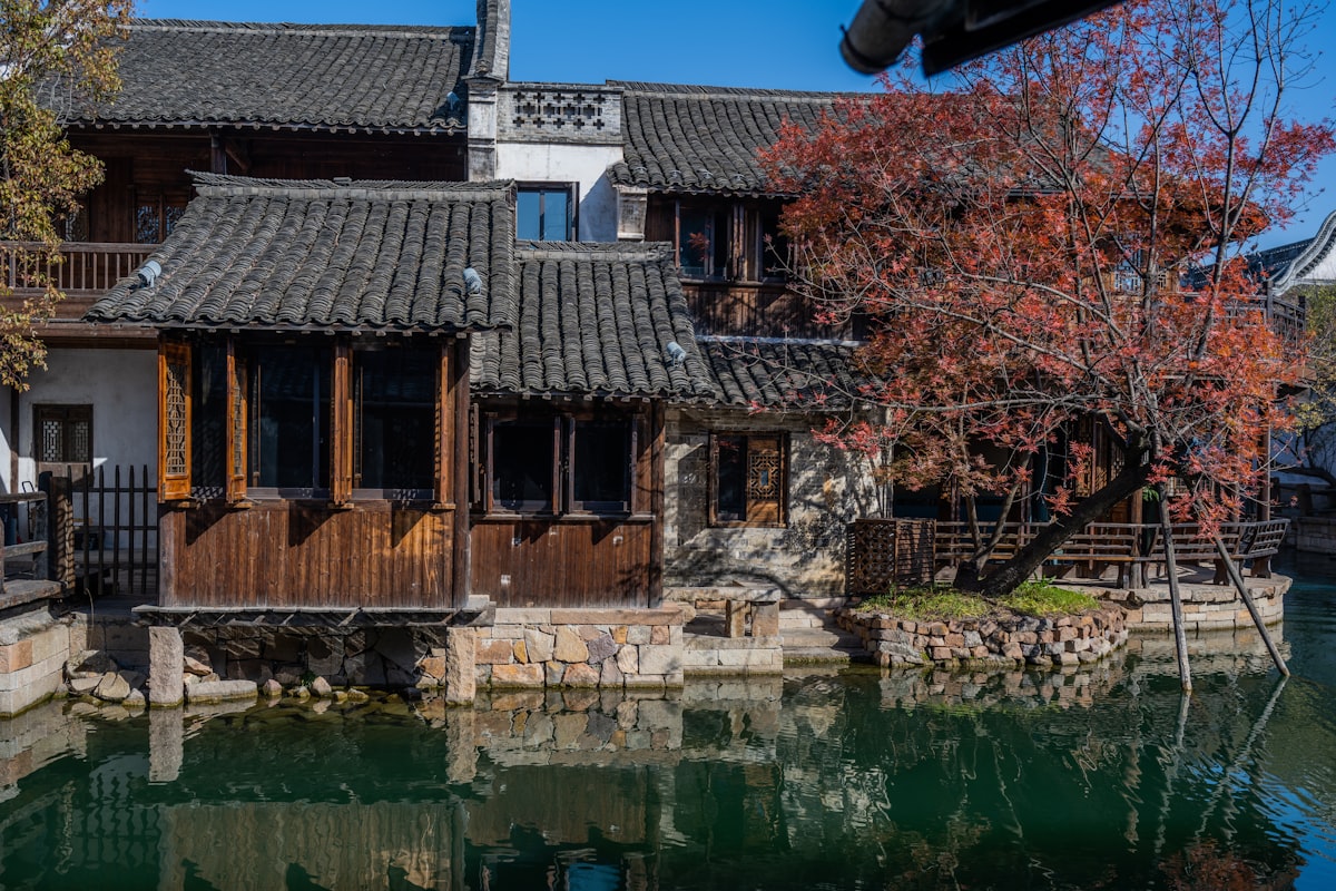 Traditional wooden houses alongside a tranquil canal