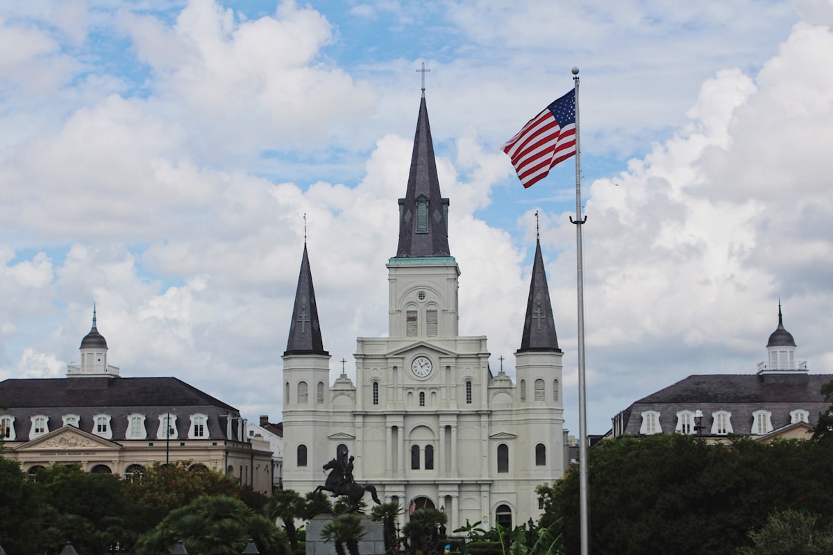 St. louis cathedral with american flag flying