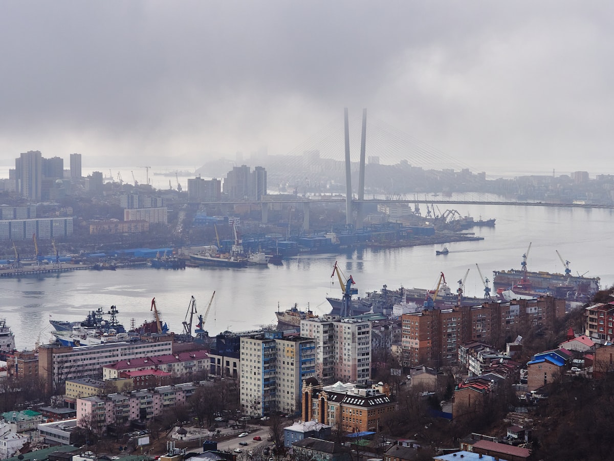 A large body of water with a city in the background