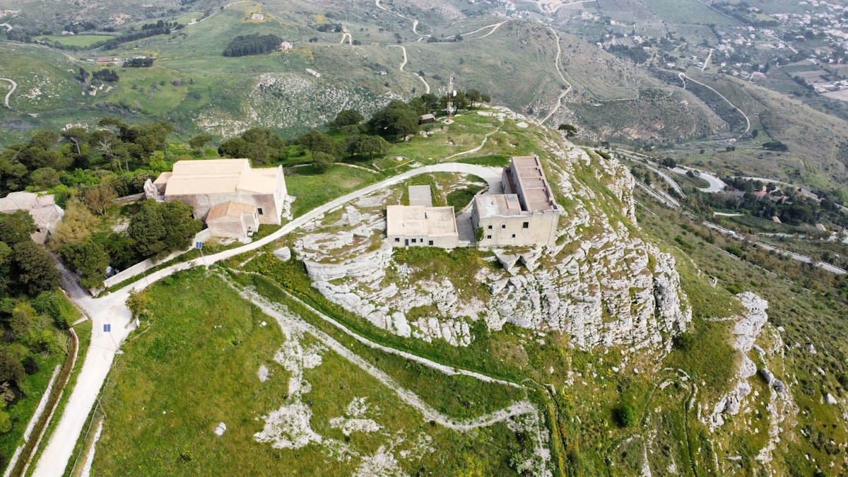 An aerial view of a mountainous castle.